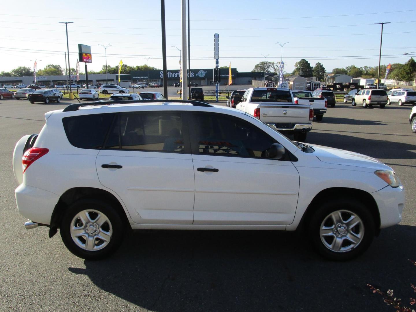 2009 WHITE Toyota RAV4 Base I4 2WD (JTMZF33V09D) with an 2.4L L4 DOHC 16V engine, 4-Speed Automatic transmission, located at 1814 Albert Pike Road, Hot Springs, AR, 71913, (501) 623-1717, 34.494228, -93.094070 - Photo#3