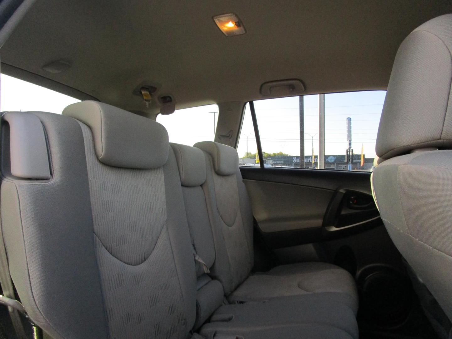 2009 WHITE Toyota RAV4 Base I4 2WD (JTMZF33V09D) with an 2.4L L4 DOHC 16V engine, 4-Speed Automatic transmission, located at 1814 Albert Pike Road, Hot Springs, AR, 71913, (501) 623-1717, 34.494228, -93.094070 - Photo#7