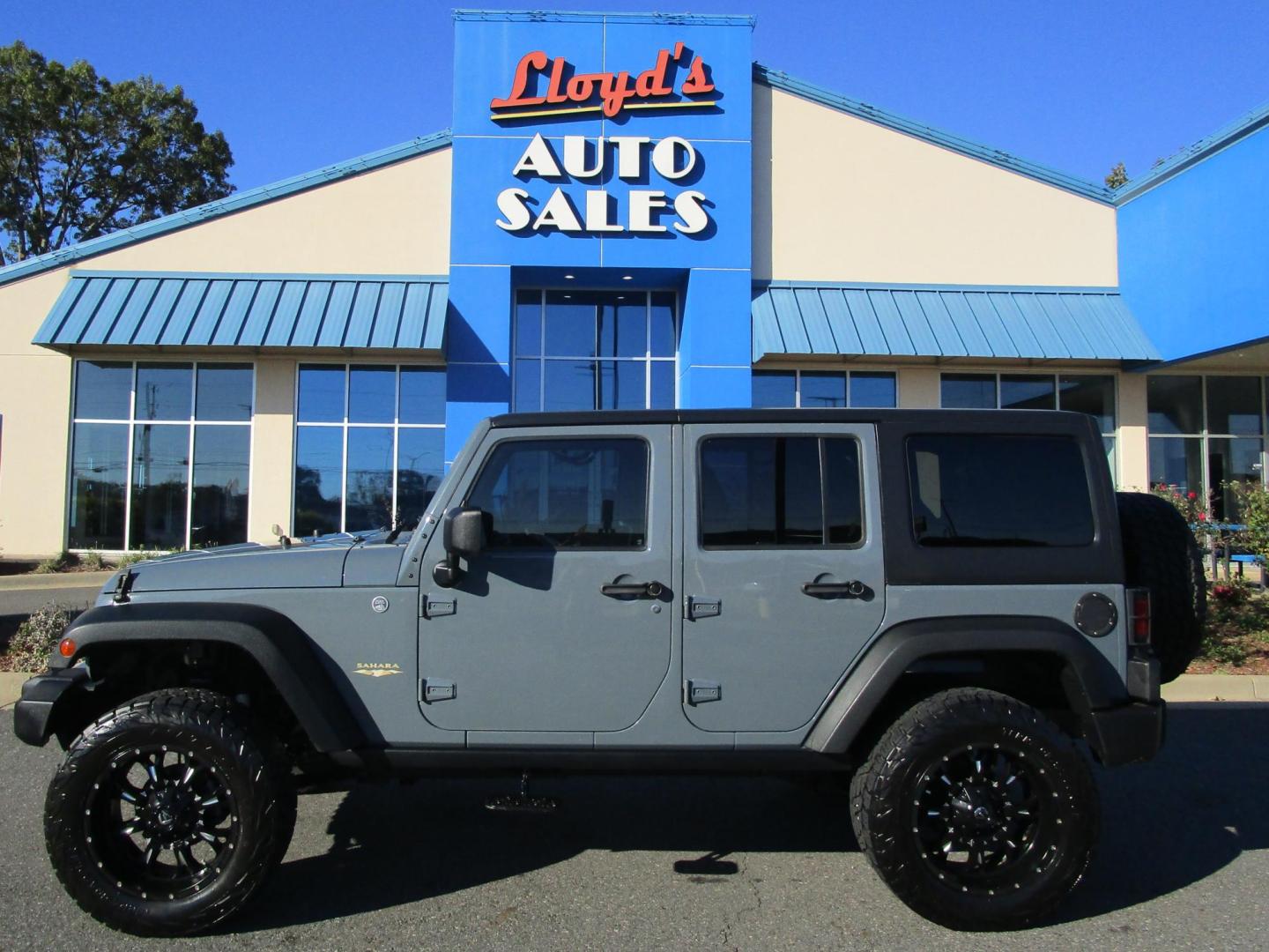 2014 GRAY /Black / Leather Jeep Wrangler Unlimited Sahara 4WD (1C4BJWEG8EL) with an 3.6L V6 DOHC 24V FFV engine, AUTOMATIC transmission, located at 1814 Albert Pike Road, Hot Springs, AR, 71913, (501) 623-1717, 34.494228, -93.094070 - Photo#0