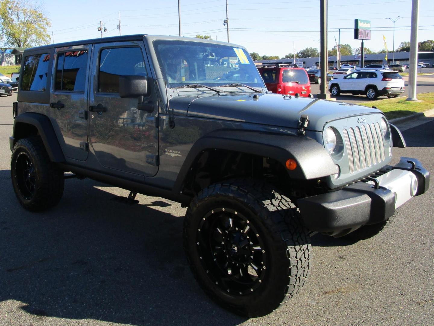 2014 GRAY /Black / Leather Jeep Wrangler Unlimited Sahara 4WD (1C4BJWEG8EL) with an 3.6L V6 DOHC 24V FFV engine, AUTOMATIC transmission, located at 1814 Albert Pike Road, Hot Springs, AR, 71913, (501) 623-1717, 34.494228, -93.094070 - Photo#3