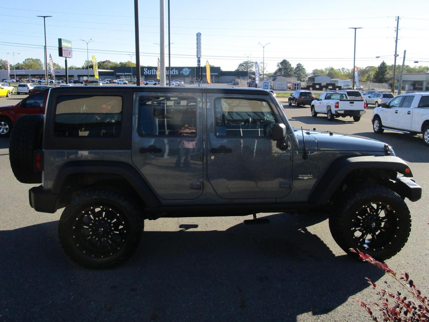 2014 GRAY /Black / Leather Jeep Wrangler Unlimited Sahara 4WD (1C4BJWEG8EL) with an 3.6L V6 DOHC 24V FFV engine, AUTOMATIC transmission, located at 1814 Albert Pike Road, Hot Springs, AR, 71913, (501) 623-1717, 34.494228, -93.094070 - Photo#4