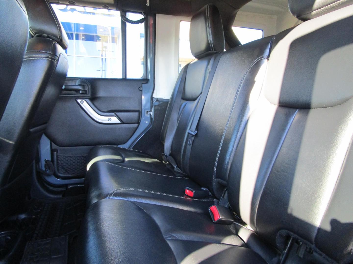 2014 GRAY /Black / Leather Jeep Wrangler Unlimited Sahara 4WD (1C4BJWEG8EL) with an 3.6L V6 DOHC 24V FFV engine, AUTOMATIC transmission, located at 1814 Albert Pike Road, Hot Springs, AR, 71913, (501) 623-1717, 34.494228, -93.094070 - Photo#7