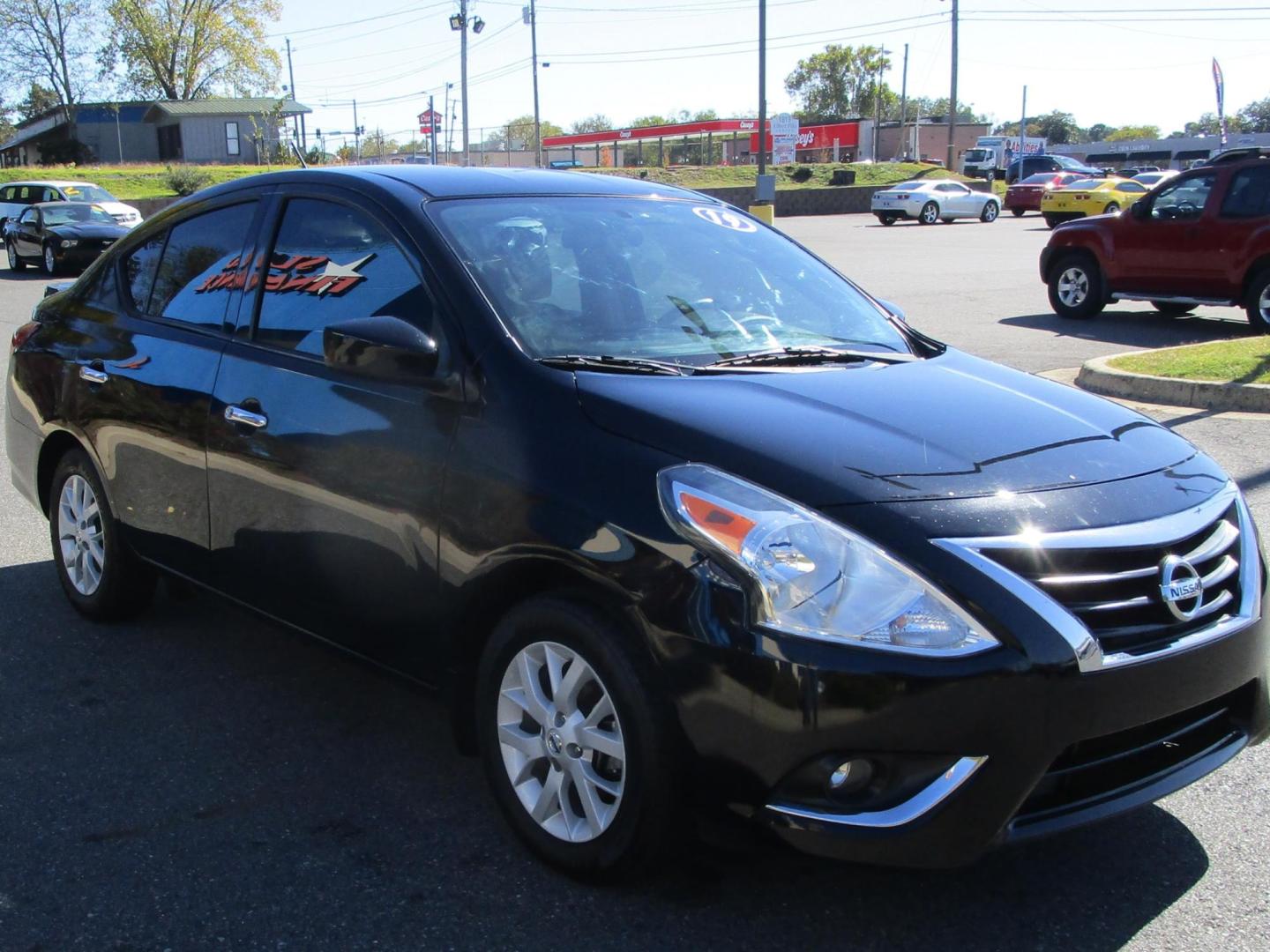 2019 BLACK /Black/Cloth Nissan Versa 1.6 SV Sedan (3N1CN7APXKL) with an 1.6L L4 DOHC 16V engine, CVT transmission, located at 1814 Albert Pike Road, Hot Springs, AR, 71913, (501) 623-1717, 34.494228, -93.094070 - Photo#3