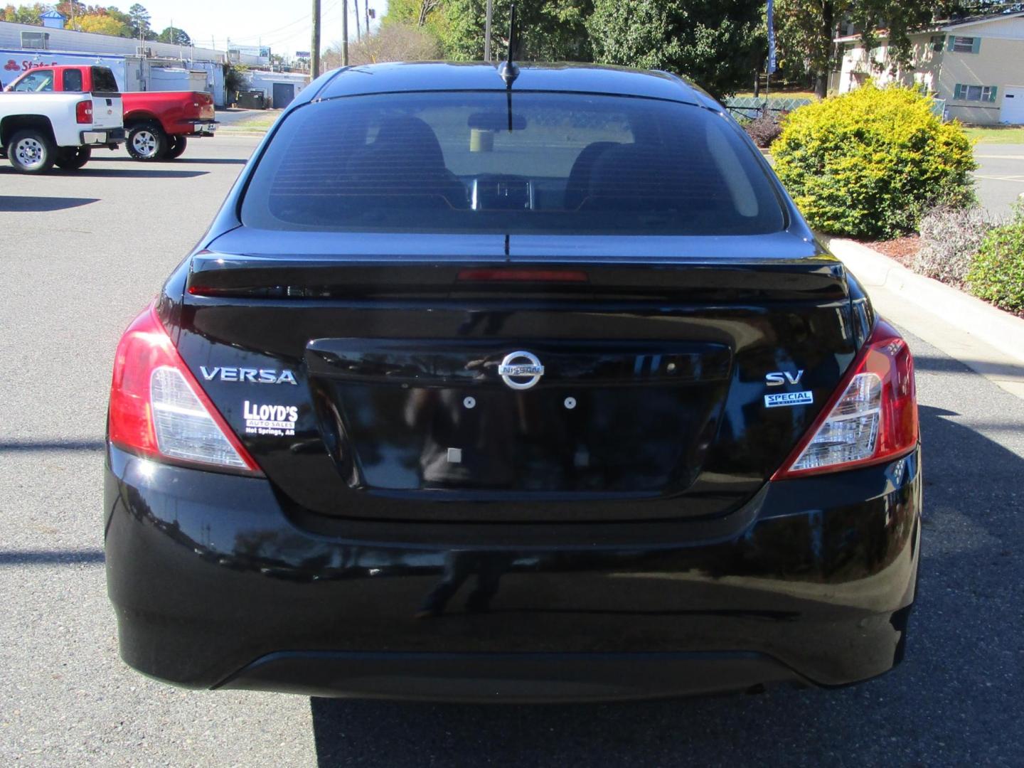 2019 BLACK /Black/Cloth Nissan Versa 1.6 SV Sedan (3N1CN7APXKL) with an 1.6L L4 DOHC 16V engine, CVT transmission, located at 1814 Albert Pike Road, Hot Springs, AR, 71913, (501) 623-1717, 34.494228, -93.094070 - Photo#5