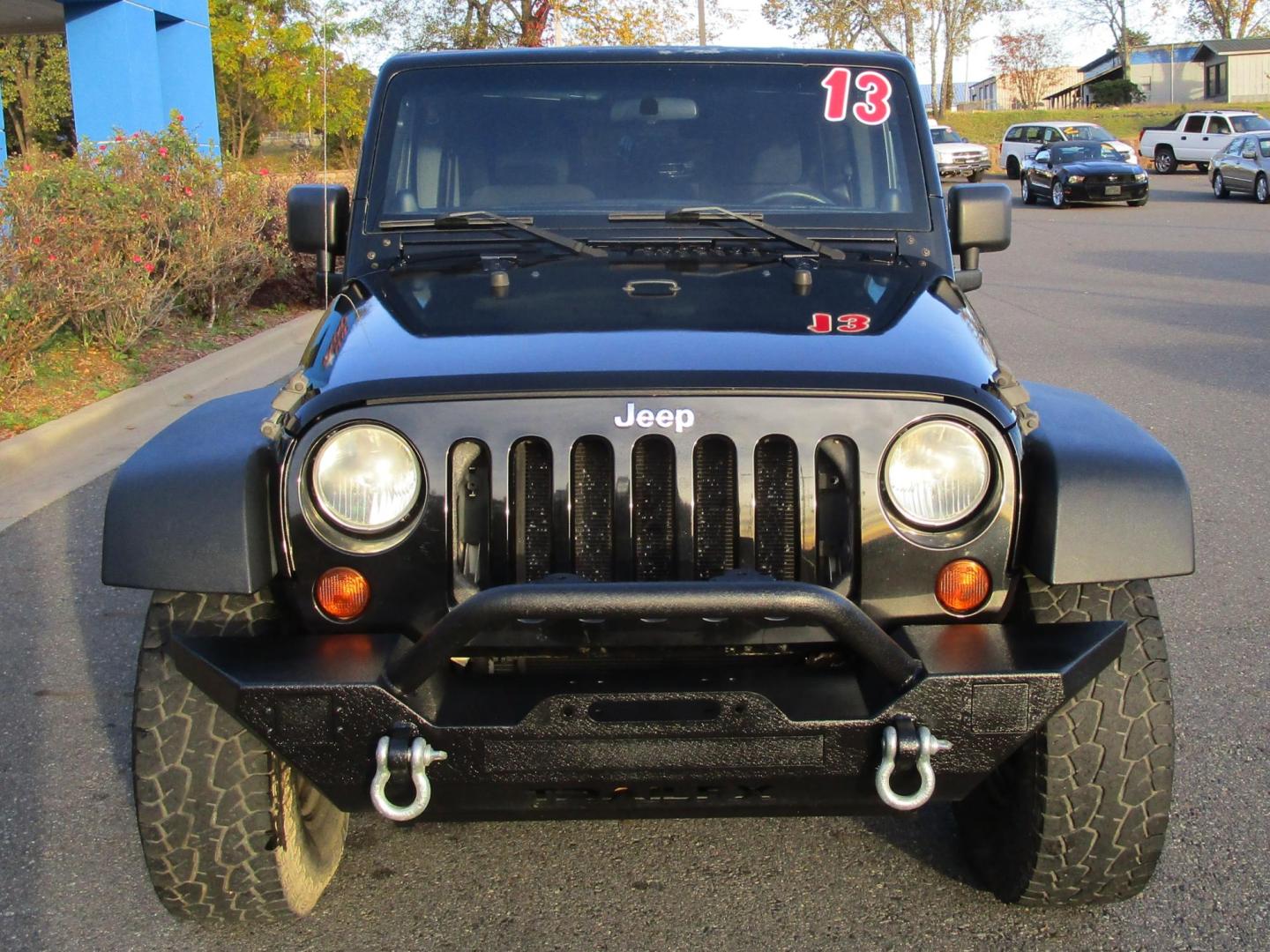 2013 BLACK /BLACK Jeep Wrangler Unlimited Sport 4WD (1C4BJWDG4DL) with an 3.6L V6 DOHC 24V FFV engine, 6-SPEED MANUAL transmission, located at 1814 Albert Pike Road, Hot Springs, AR, 71913, (501) 623-1717, 34.494228, -93.094070 - Photo#2