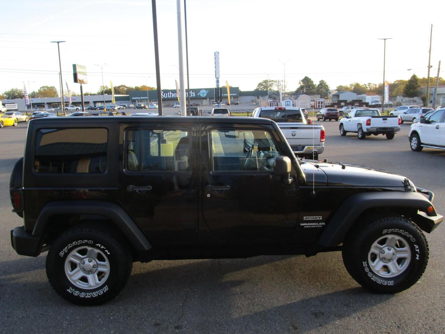2013 BLACK /BLACK Jeep Wrangler Unlimited Sport 4WD (1C4BJWDG4DL) with an 3.6L V6 DOHC 24V FFV engine, 6-SPEED MANUAL transmission, located at 1814 Albert Pike Road, Hot Springs, AR, 71913, (501) 623-1717, 34.494228, -93.094070 - Photo#4