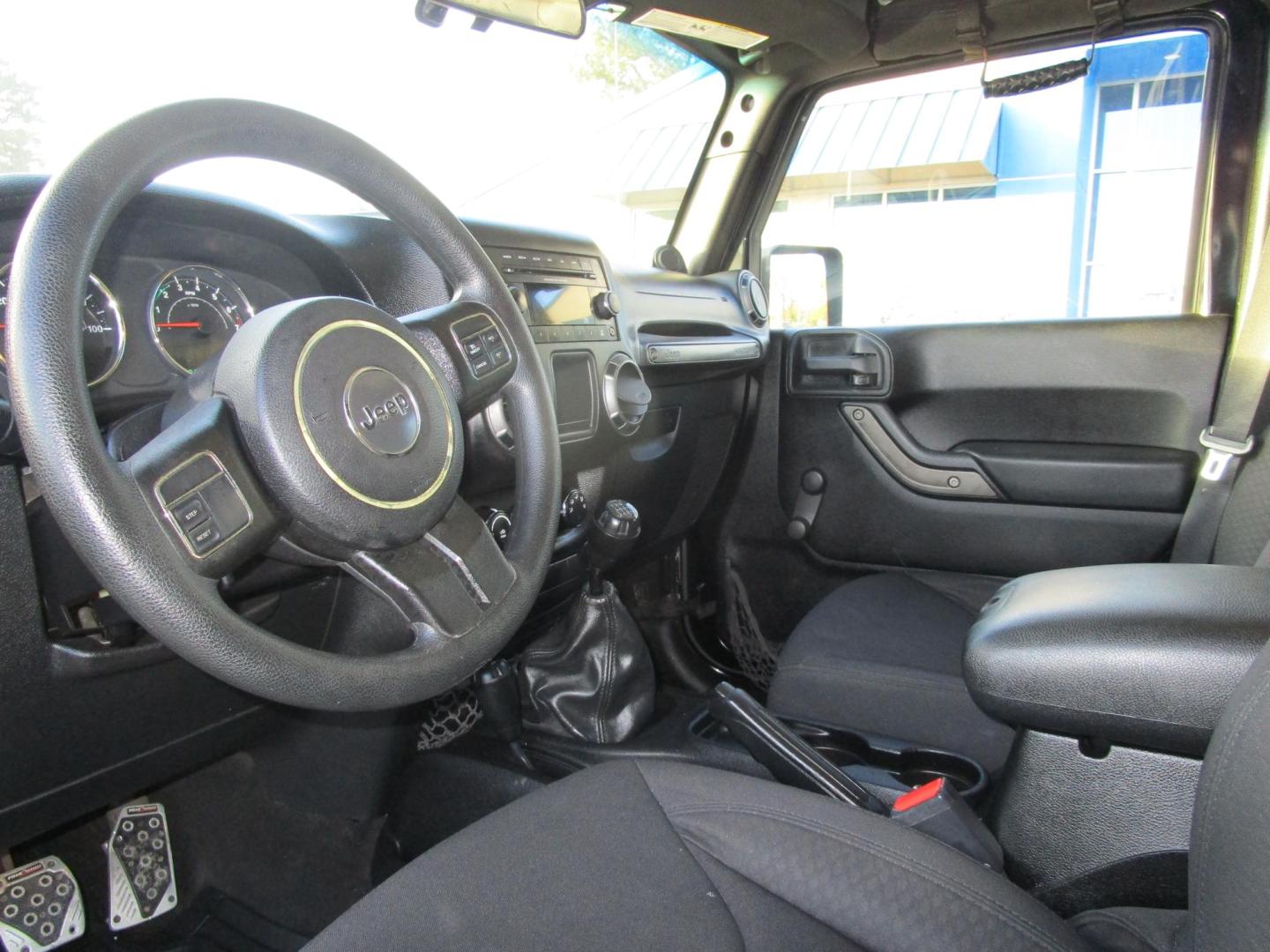 2013 BLACK /BLACK Jeep Wrangler Unlimited Sport 4WD (1C4BJWDG4DL) with an 3.6L V6 DOHC 24V FFV engine, 6-SPEED MANUAL transmission, located at 1814 Albert Pike Road, Hot Springs, AR, 71913, (501) 623-1717, 34.494228, -93.094070 - Photo#6