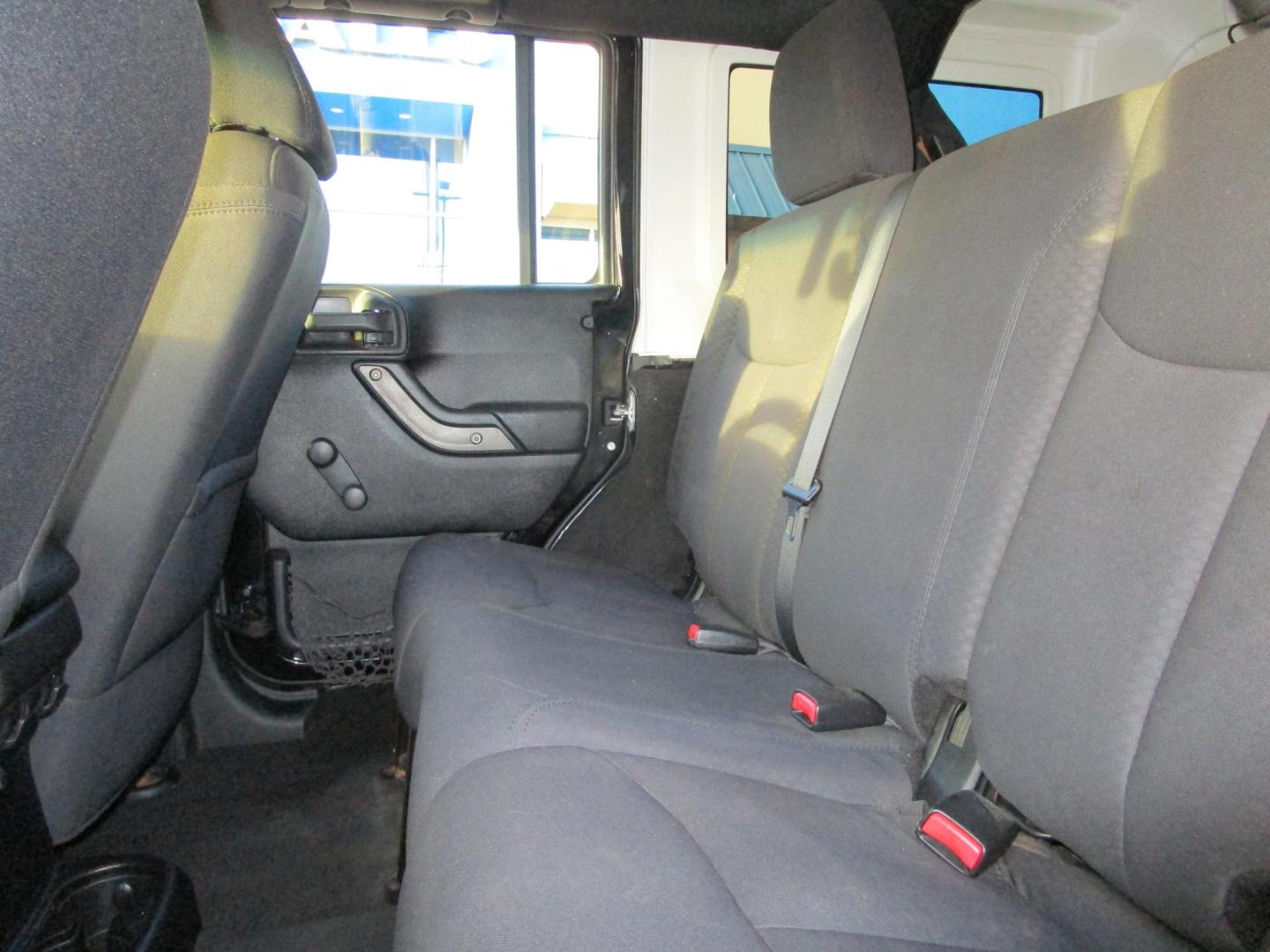 2013 BLACK /BLACK Jeep Wrangler Unlimited Sport 4WD (1C4BJWDG4DL) with an 3.6L V6 DOHC 24V FFV engine, 6-SPEED MANUAL transmission, located at 1814 Albert Pike Road, Hot Springs, AR, 71913, (501) 623-1717, 34.494228, -93.094070 - Photo#7