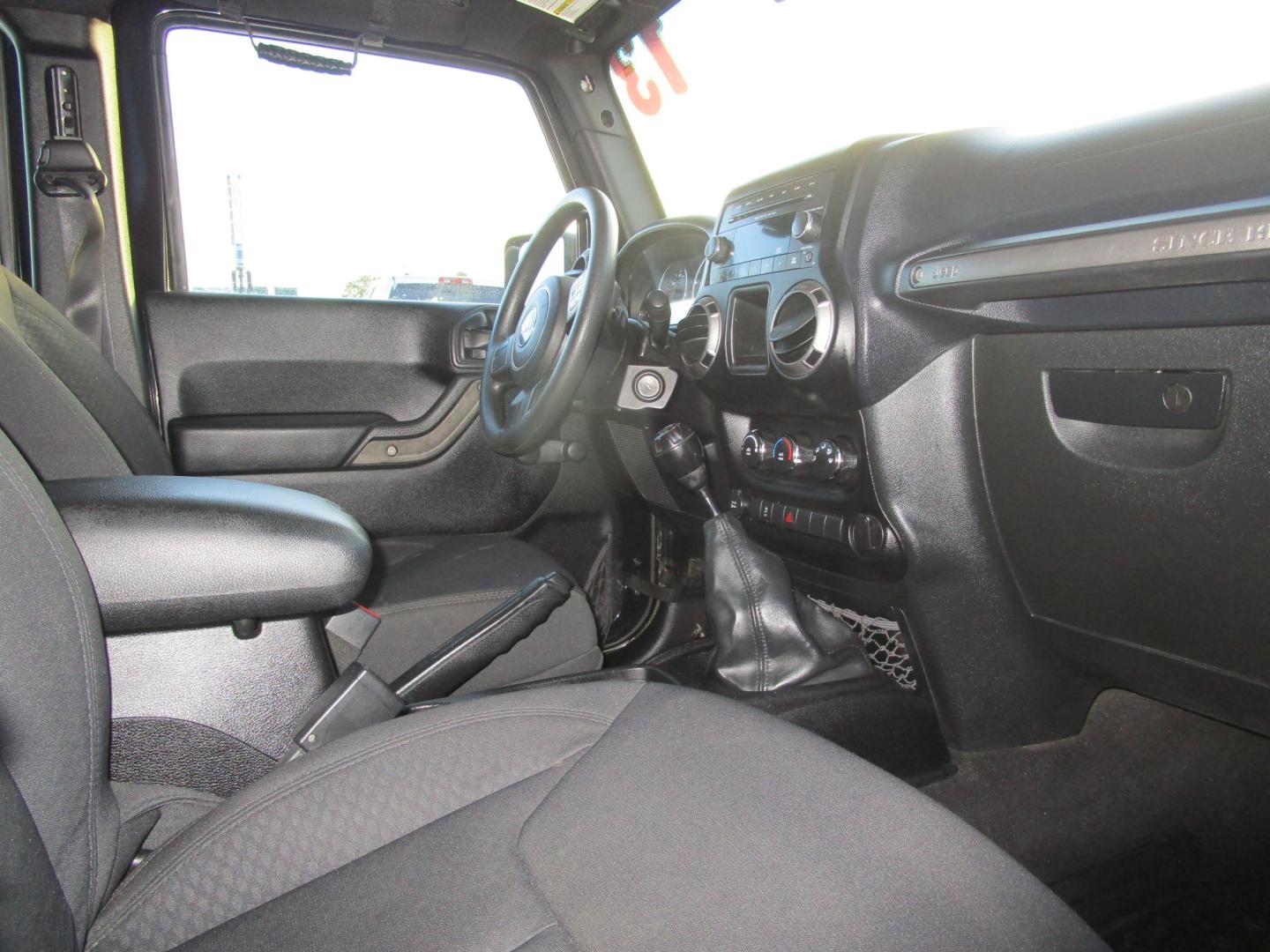 2013 BLACK /BLACK Jeep Wrangler Unlimited Sport 4WD (1C4BJWDG4DL) with an 3.6L V6 DOHC 24V FFV engine, 6-SPEED MANUAL transmission, located at 1814 Albert Pike Road, Hot Springs, AR, 71913, (501) 623-1717, 34.494228, -93.094070 - Photo#9