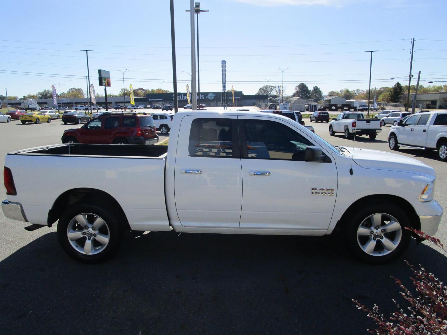 2015 WHITE RAM 1500 SLT Quad Cab 2WD (1C6RR6GG3FS) with an 3.6L V6 DOHC 24V FFV engine, 6-Speed Automatic transmission, located at 1814 Albert Pike Road, Hot Springs, AR, 71913, (501) 623-1717, 34.494228, -93.094070 - Photo#4