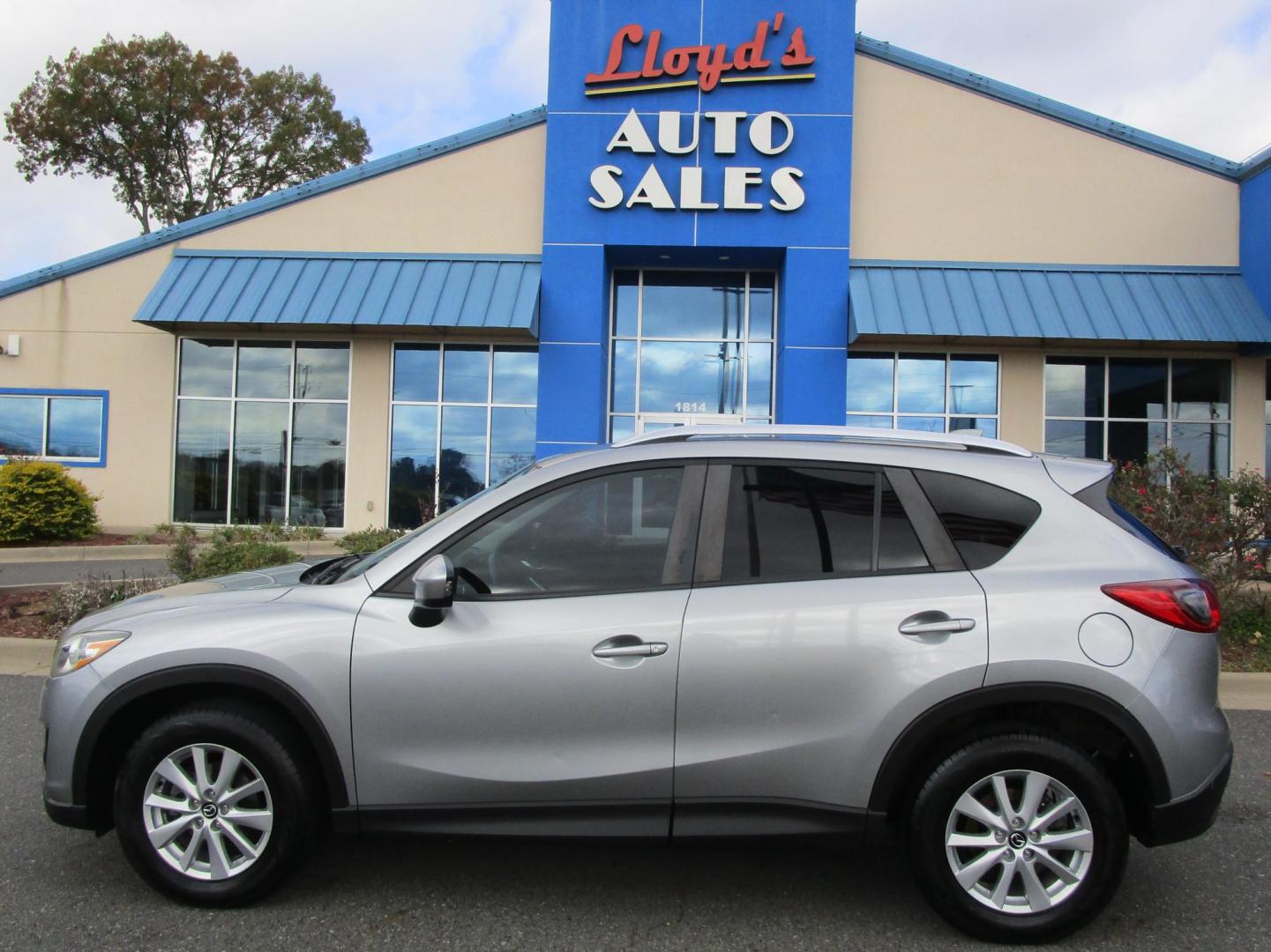2014 SILVER /BLACK Mazda CX-5 Touring (JM3KE2CY8E0) with an 2.5L L4 DOHC 16V engine, 6-Speed Automatic transmission, located at 1814 Albert Pike Road, Hot Springs, AR, 71913, (501) 623-1717, 34.494228, -93.094070 - Photo#0