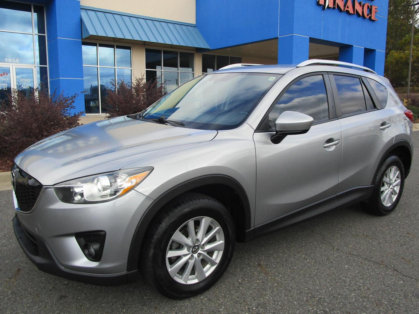 2014 SILVER /BLACK Mazda CX-5 Touring (JM3KE2CY8E0) with an 2.5L L4 DOHC 16V engine, 6-Speed Automatic transmission, located at 1814 Albert Pike Road, Hot Springs, AR, 71913, (501) 623-1717, 34.494228, -93.094070 - Photo#1