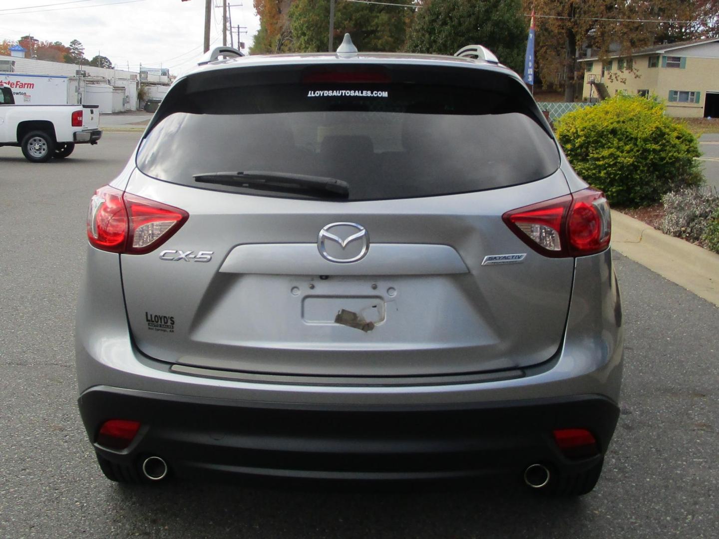 2014 SILVER /BLACK Mazda CX-5 Touring (JM3KE2CY8E0) with an 2.5L L4 DOHC 16V engine, 6-Speed Automatic transmission, located at 1814 Albert Pike Road, Hot Springs, AR, 71913, (501) 623-1717, 34.494228, -93.094070 - Photo#5
