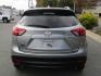 2014 SILVER /BLACK Mazda CX-5 Touring (JM3KE2CY8E0) with an 2.5L L4 DOHC 16V engine, 6-Speed Automatic transmission, located at 1814 Albert Pike Road, Hot Springs, AR, 71913, (501) 623-1717, 34.494228, -93.094070 - Photo#5