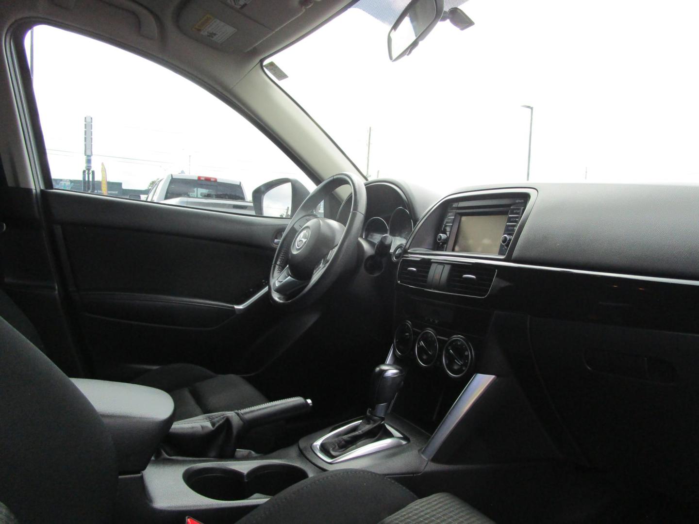 2014 SILVER /BLACK Mazda CX-5 Touring (JM3KE2CY8E0) with an 2.5L L4 DOHC 16V engine, 6-Speed Automatic transmission, located at 1814 Albert Pike Road, Hot Springs, AR, 71913, (501) 623-1717, 34.494228, -93.094070 - Photo#9