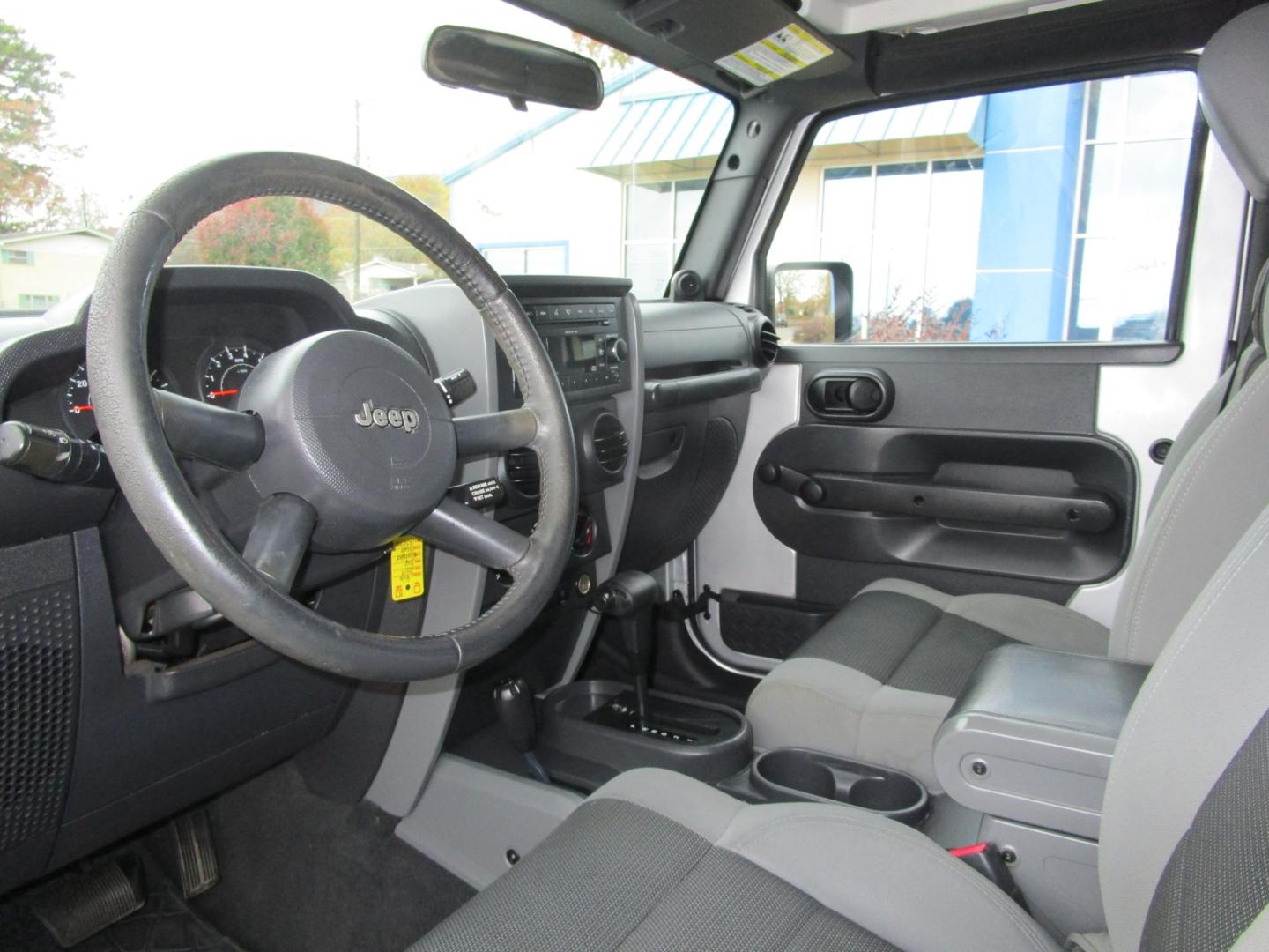 2007 SILVER Jeep Wrangler X (1J4FA24167L) with an 3.8L V6 OHV 12V engine, located at 1814 Albert Pike Road, Hot Springs, AR, 71913, (501) 623-1717, 34.494228, -93.094070 - Photo#6