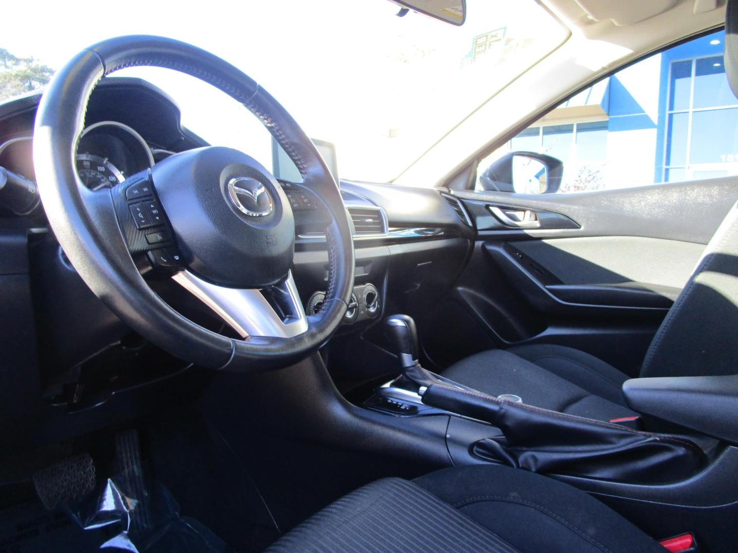 2015 BLACK /BLACK Mazda MAZDA3 i Touring AT 4-Door (3MZBM1V70FM) with an 2.0L L4 DOHC 16V engine, 6-Speed Automatic transmission, located at 1814 Albert Pike Road, Hot Springs, AR, 71913, (501) 623-1717, 34.494228, -93.094070 - Photo#6