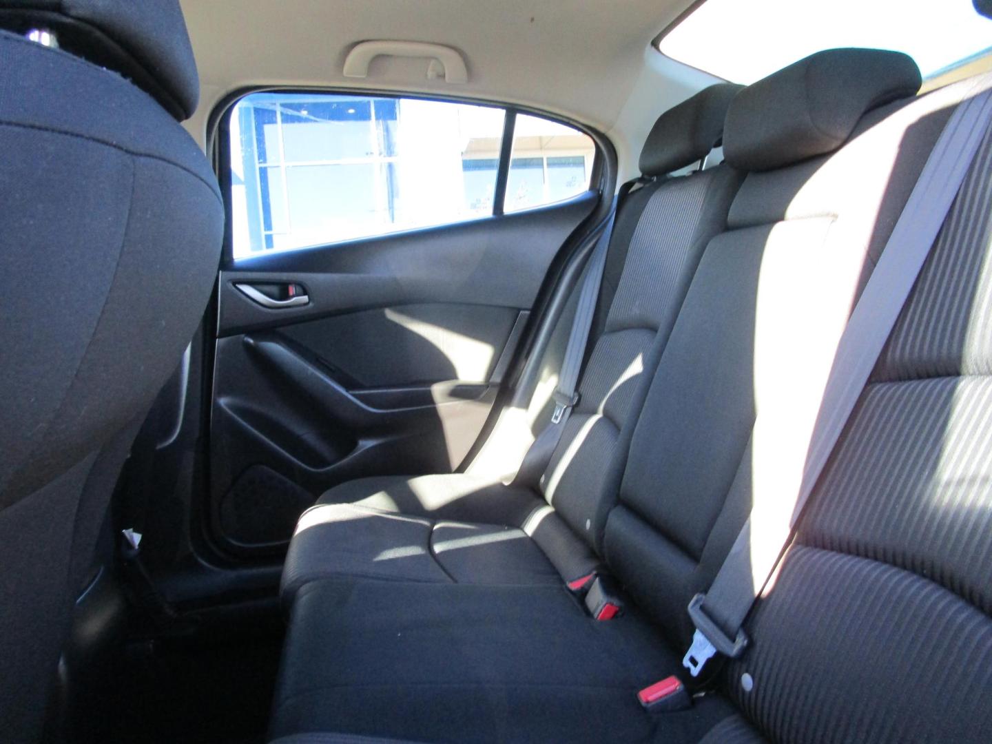 2015 BLACK /BLACK Mazda MAZDA3 i Touring AT 4-Door (3MZBM1V70FM) with an 2.0L L4 DOHC 16V engine, 6-Speed Automatic transmission, located at 1814 Albert Pike Road, Hot Springs, AR, 71913, (501) 623-1717, 34.494228, -93.094070 - Photo#7