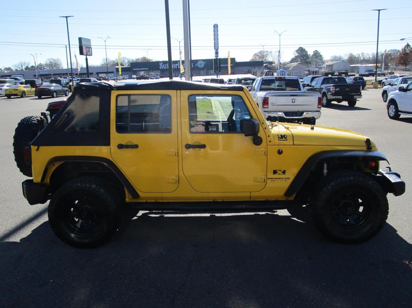 2008 Yellow /BLACK Jeep Wrangler Unlimited X 4WD (1J8GA391X8L) with an 3.8L V6 OHV 12V engine, located at 1814 Albert Pike Road, Hot Springs, AR, 71913, (501) 623-1717, 34.494228, -93.094070 - Photo#4