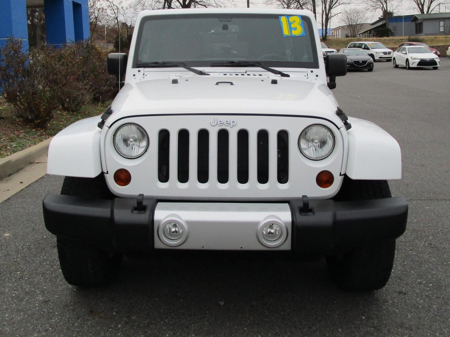 2013 WHITE /Tan / Leather Jeep Wrangler Unlimited Sahara 4WD (1C4BJWEG5DL) with an 3.6L V6 DOHC 24V FFV engine, located at 1814 Albert Pike Road, Hot Springs, AR, 71913, (501) 623-1717, 34.494228, -93.094070 - Photo#2