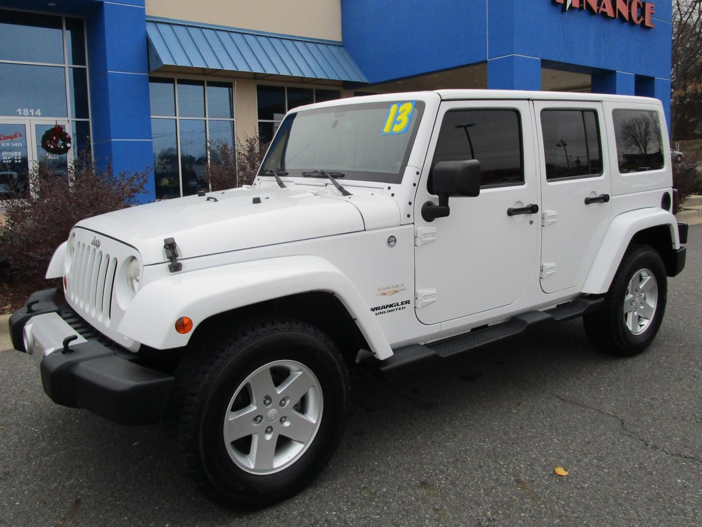 2013 WHITE /Tan / Leather Jeep Wrangler Unlimited Sahara 4WD (1C4BJWEG5DL) with an 3.6L V6 DOHC 24V FFV engine, located at 1814 Albert Pike Road, Hot Springs, AR, 71913, (501) 623-1717, 34.494228, -93.094070 - Photo#1