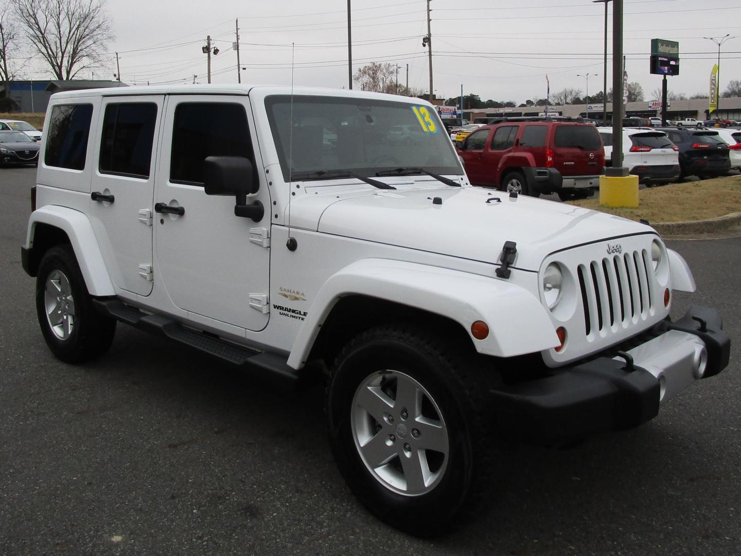 2013 WHITE /Tan / Leather Jeep Wrangler Unlimited Sahara 4WD (1C4BJWEG5DL) with an 3.6L V6 DOHC 24V FFV engine, located at 1814 Albert Pike Road, Hot Springs, AR, 71913, (501) 623-1717, 34.494228, -93.094070 - Photo#3