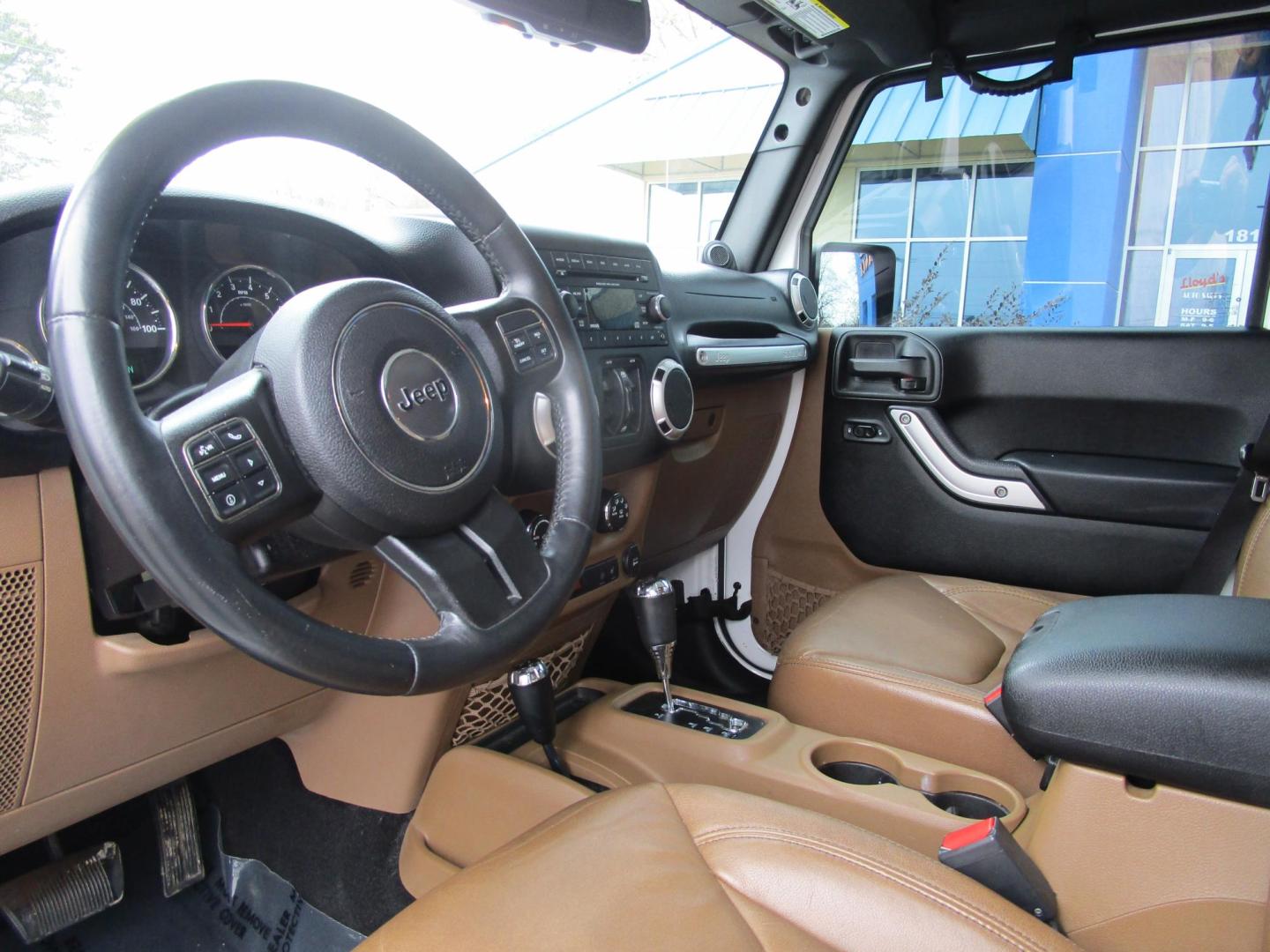 2013 WHITE /Tan / Leather Jeep Wrangler Unlimited Sahara 4WD (1C4BJWEG5DL) with an 3.6L V6 DOHC 24V FFV engine, located at 1814 Albert Pike Road, Hot Springs, AR, 71913, (501) 623-1717, 34.494228, -93.094070 - Photo#6