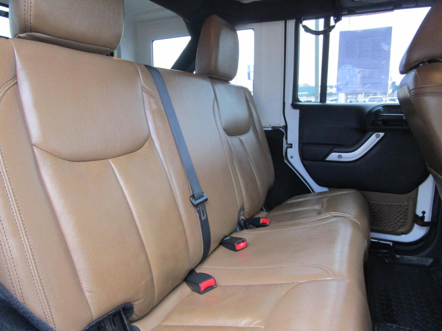 2013 WHITE /Tan / Leather Jeep Wrangler Unlimited Sahara 4WD (1C4BJWEG5DL) with an 3.6L V6 DOHC 24V FFV engine, located at 1814 Albert Pike Road, Hot Springs, AR, 71913, (501) 623-1717, 34.494228, -93.094070 - Photo#8