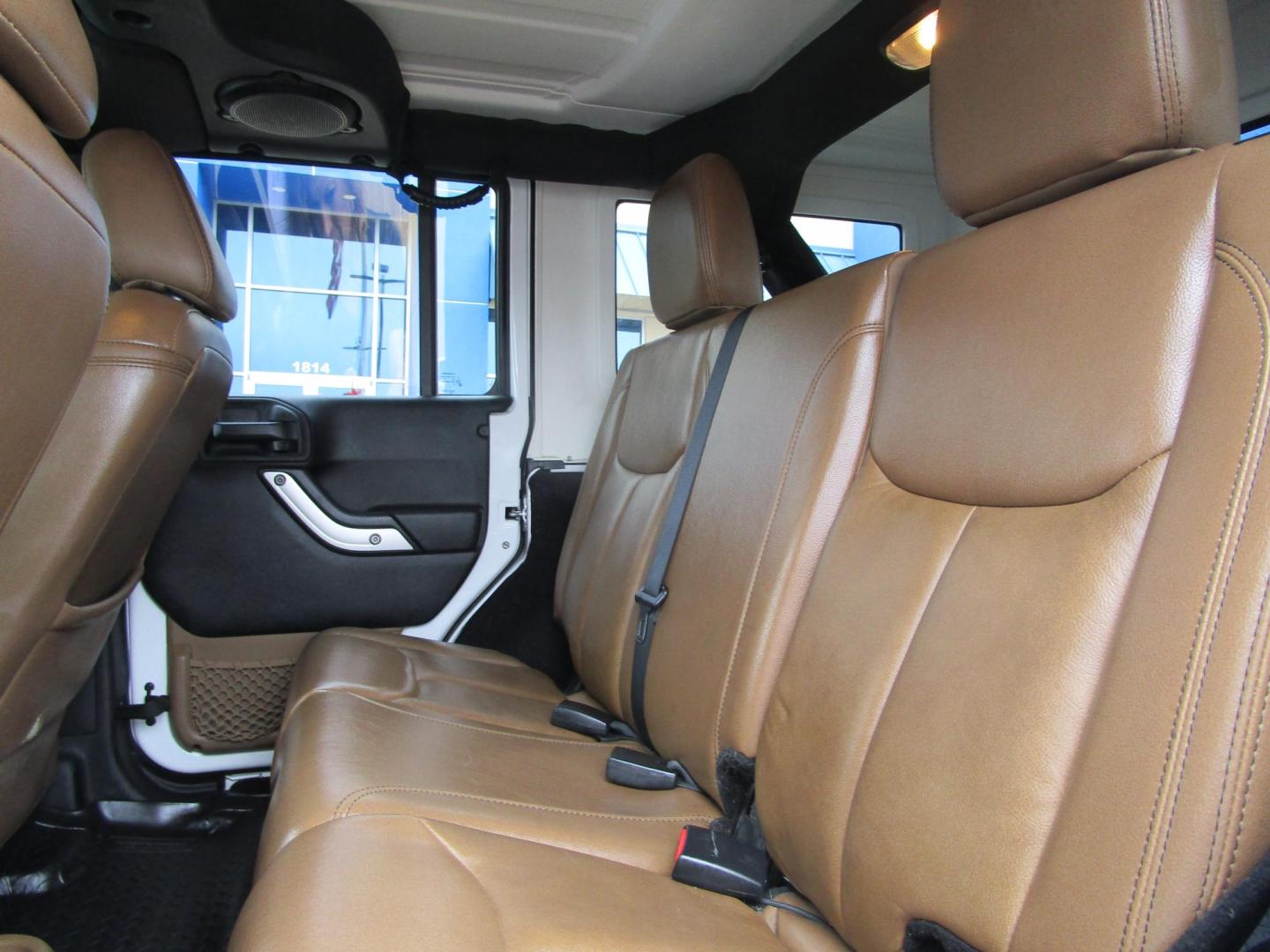 2013 WHITE /Tan / Leather Jeep Wrangler Unlimited Sahara 4WD (1C4BJWEG5DL) with an 3.6L V6 DOHC 24V FFV engine, located at 1814 Albert Pike Road, Hot Springs, AR, 71913, (501) 623-1717, 34.494228, -93.094070 - Photo#7