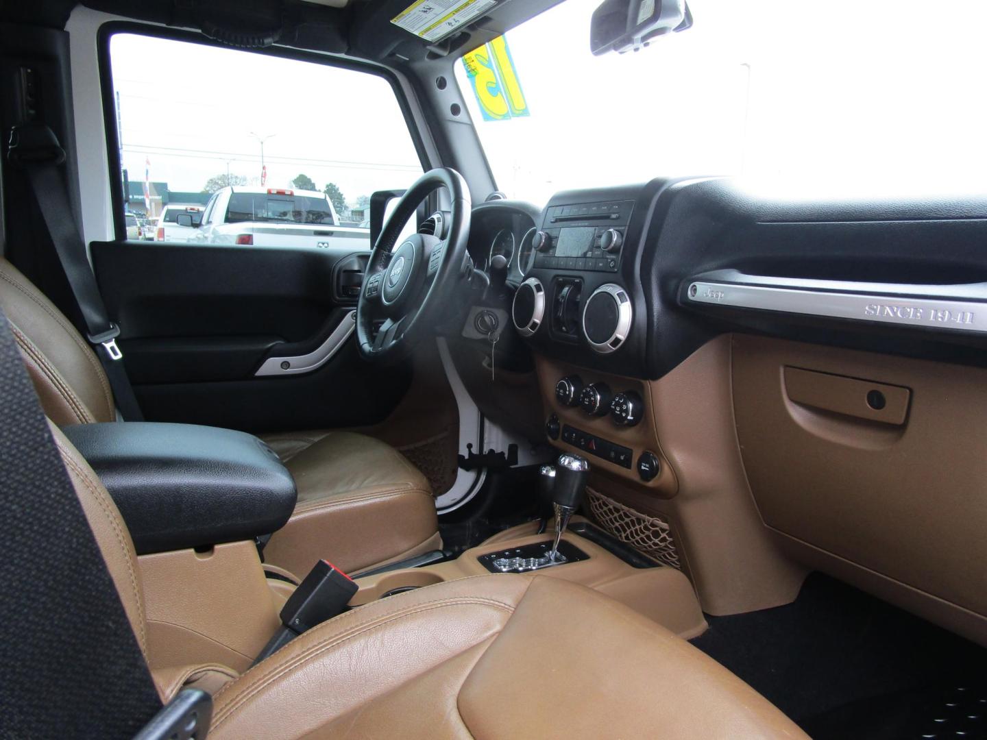 2013 WHITE /Tan / Leather Jeep Wrangler Unlimited Sahara 4WD (1C4BJWEG5DL) with an 3.6L V6 DOHC 24V FFV engine, located at 1814 Albert Pike Road, Hot Springs, AR, 71913, (501) 623-1717, 34.494228, -93.094070 - Photo#9