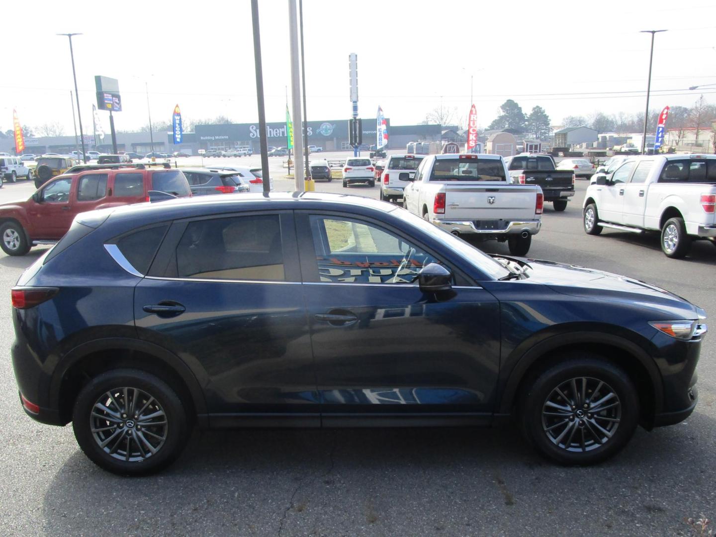 2021 Blue /BLACK Mazda CX-5 Touring (JM3KFACM1M0) with an 2.5L L4 DOHC 16V engine, 6A transmission, located at 1814 Albert Pike Road, Hot Springs, AR, 71913, (501) 623-1717, 34.494228, -93.094070 - Photo#4
