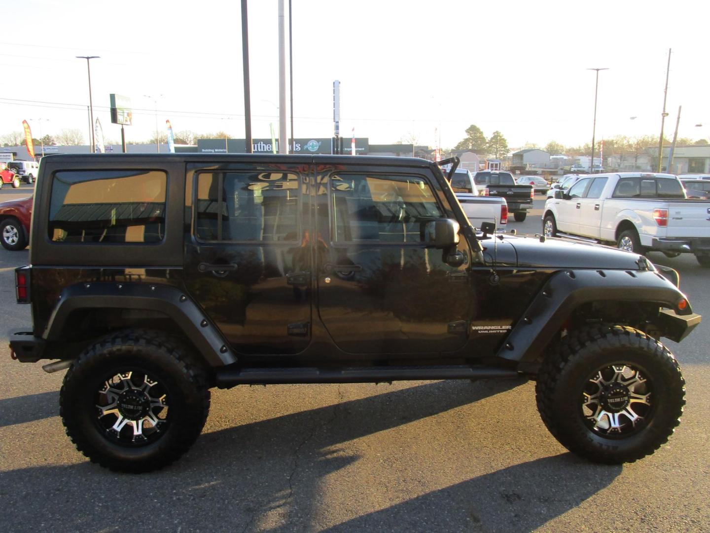 2016 BLACK /BLACK Jeep Wrangler Unlimited Sport 4WD (1C4BJWDG7GL) with an 3.6L V6 DOHC 24V FFV engine, located at 1814 Albert Pike Road, Hot Springs, AR, 71913, (501) 623-1717, 34.494228, -93.094070 - Photo#4