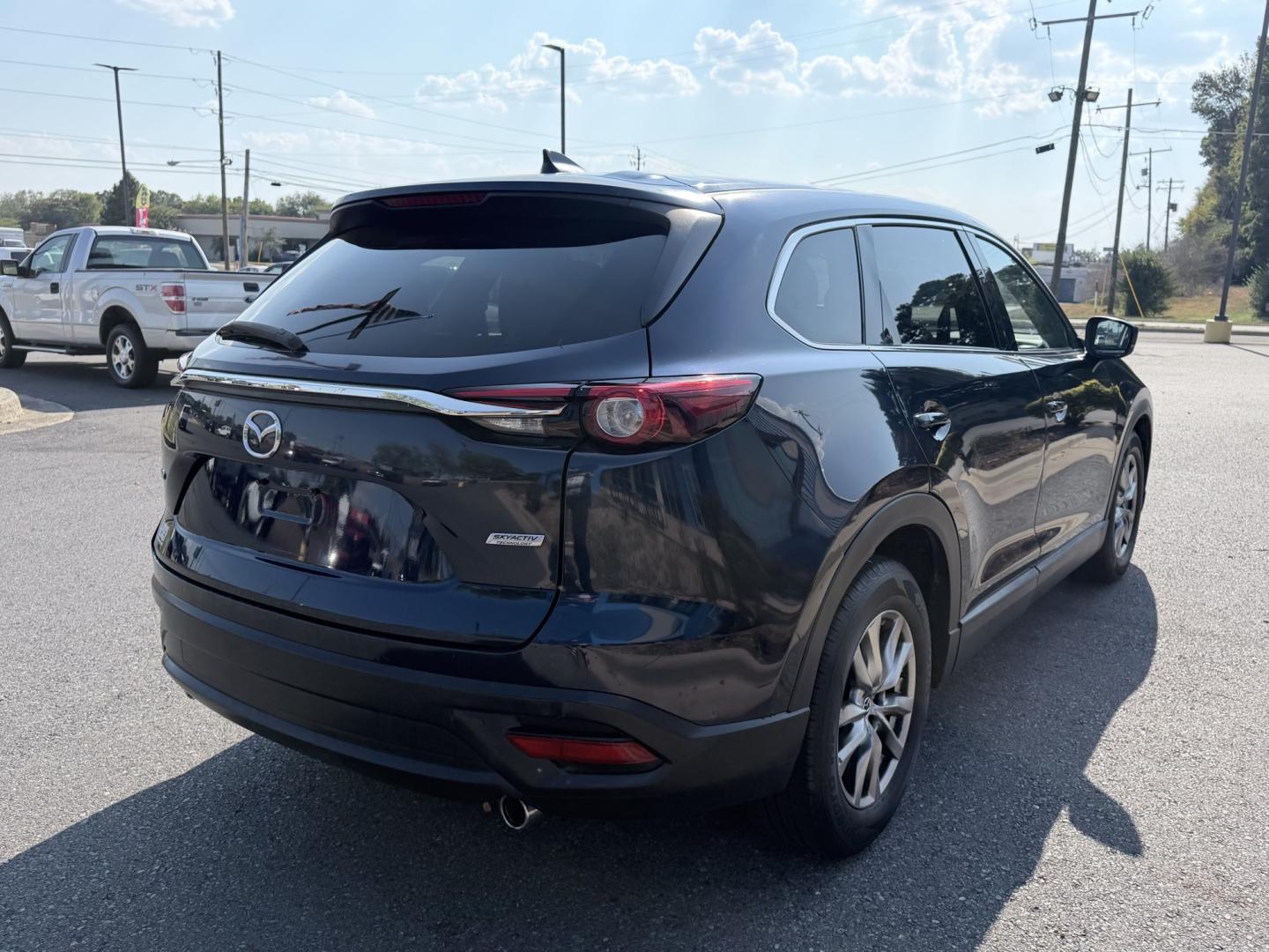 2016 BLUE Mazda CX-9 Touring FWD (JM3TCACY1G0) with an 2.5L L4 DOHC 16V engine, 6A transmission, located at 1814 Albert Pike Road, Hot Springs, AR, 71913, (501) 623-1717, 34.494228, -93.094070- Photo#2